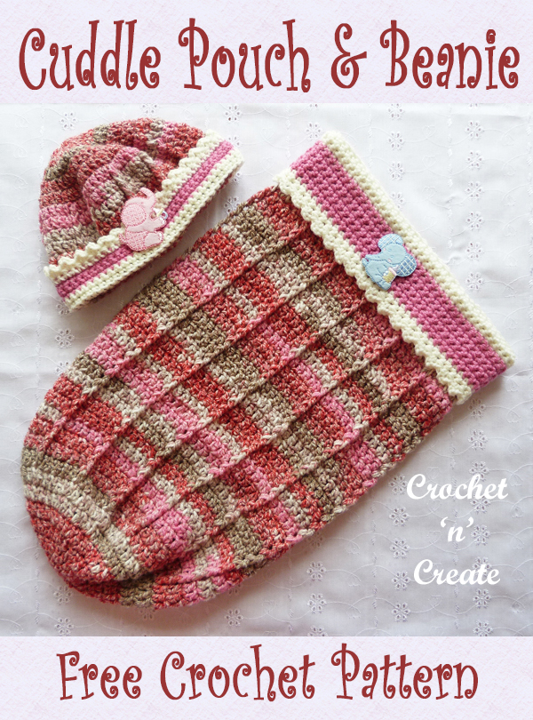 baby cuddle pouch and beanie