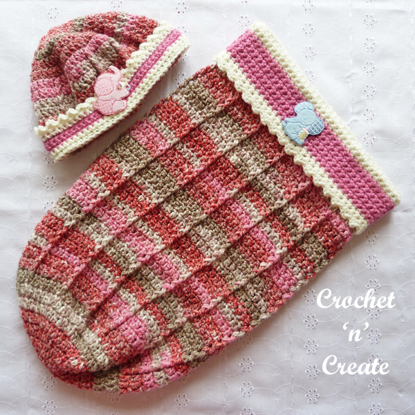 baby cuddle pouch and beanie