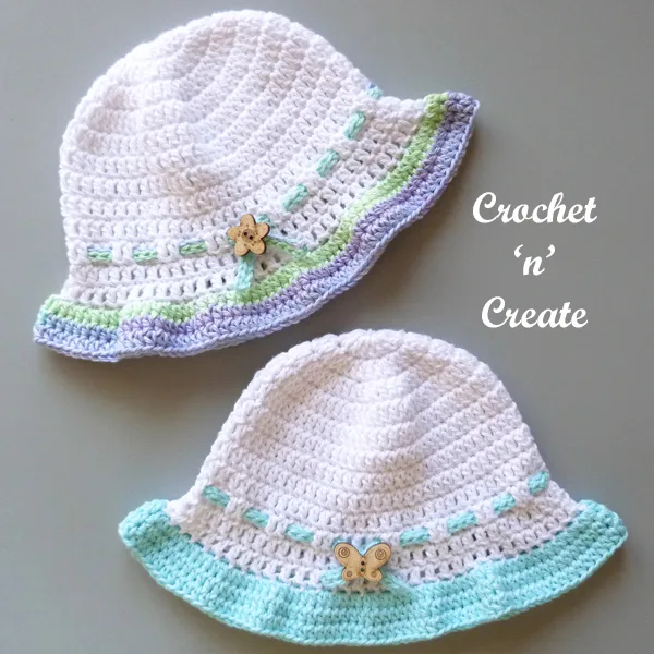 two infant hats