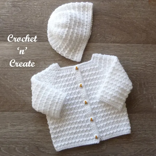 white infant outfit