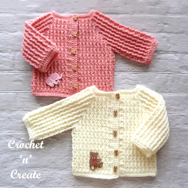 cream-pink infant sweater