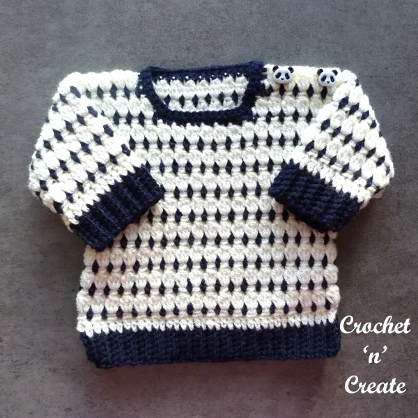 cluster block baby sweater